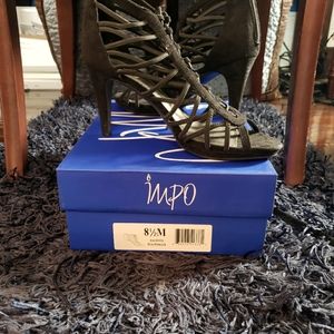 Ladies black suede lace up and back zipper heels